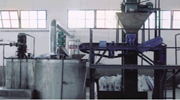 Urea-based slurry-spraying granulation system